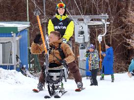 Ukrainian war veterans visit adaptive skiing training session in Kyiv