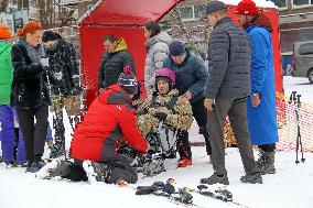 Ukrainian war veterans visit adaptive skiing training session in Kyiv