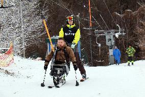 Ukrainian war veterans visit adaptive skiing training session in Kyiv