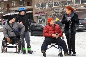 Ukrainian war veterans visit adaptive skiing training session in Kyiv