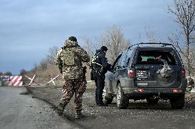 Ukrainian police officers at roadblock in Zaporizhzhia region