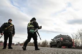 Ukrainian police officers at roadblock in Zaporizhzhia region