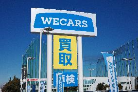 Logo and signage for WECARS Co., Ltd.