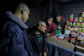 Displaced Residents Follow the News - Gaza