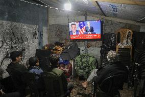 Displaced Residents Follow the News - Gaza