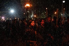 Torch Procession To Protest Attack