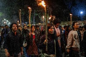 Torch Procession To Protest Attack