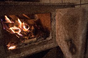 A Free-standing Wood Stove Seen In The Polish Countryside In Debe Wielkie