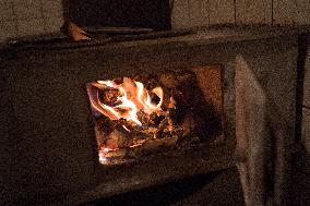 A Free-standing Wood Stove Seen In The Polish Countryside In Debe Wielkie