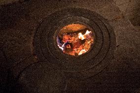 A Free-standing Wood Stove Seen In The Polish Countryside In Debe Wielkie