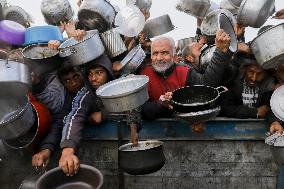 Waiting For Food In Gaza