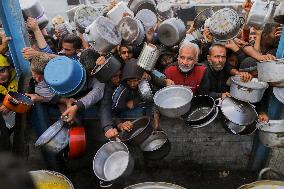 Waiting For Food In Gaza