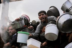 Waiting For Food In Gaza