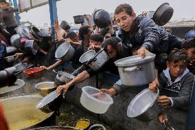 Waiting For Food In Gaza