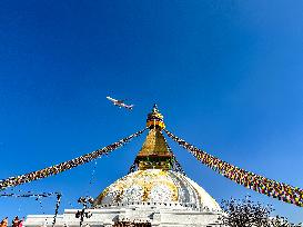 Thai Airways Flight Over Boudhanath Stupa In Nepal.