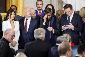 Elon Musk Holds His Phone At Trump Inauguration - DC