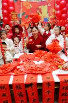Children Learning Folk Customs to Welcome Chinese Lunar New Year