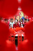 Children Learning Folk Customs to Welcome Chinese Lunar New Year