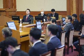 Impeached S. Korean president attends court hearing