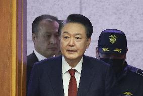 Impeached S. Korean president attends court hearing