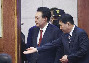Impeached S. Korean president attends court hearing