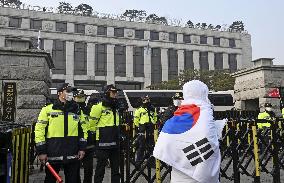 Impeached S. Korean president attends court hearing