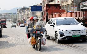 Migrant Workers Ride Motorcycles Home For Chinese Lunar New Year