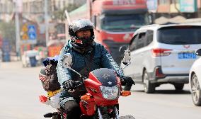 Migrant Workers Ride Motorcycles Home For Chinese Lunar New Year