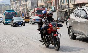 Migrant Workers Ride Motorcycles Home For Chinese Lunar New Year