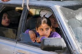 Palestinians Return to Gaza