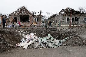 Aftermath of Russian shelling in Yasnohirka village in eastern Ukraine