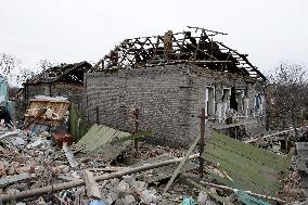 Aftermath of Russian shelling in Yasnohirka village in eastern Ukraine