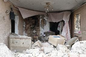 Aftermath of Russian shelling in Yasnohirka village in eastern Ukraine