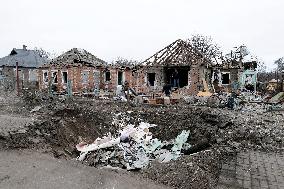 Aftermath of Russian shelling in Yasnohirka village in eastern Ukraine