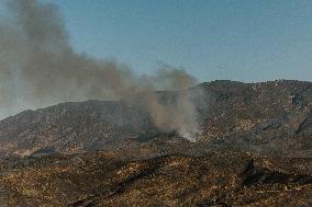 Smoke And Damages Caused By Hughes Fire - USA