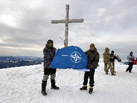 Representatives of NATO, EU member states and Ukraines military climb Mount Hoverla