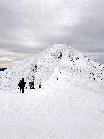 Representatives of NATO, EU member states and Ukraines military climb Mount Hoverla