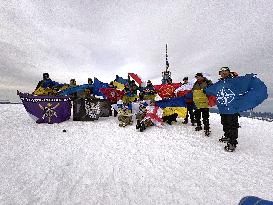 Representatives of NATO, EU member states and Ukraines military climb Mount Hoverla