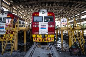 Maintenance Workers Fix Locomotive Parts - Nairobi