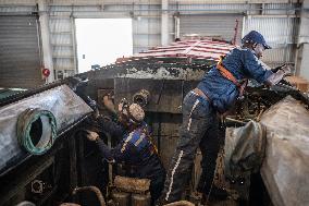 Maintenance Workers Fix Locomotive Parts - Nairobi