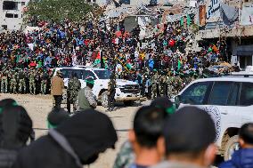 Hamas Fighters Escort Four Israeli Hostages - Gaza