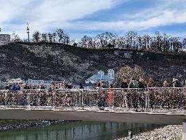 Tourists Sightseeing In Salzburg