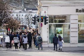 Tourists Sightseeing In Salzburg