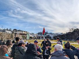 Tourists Sightseeing In Salzburg