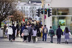 Tourists Sightseeing In Salzburg