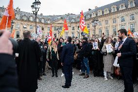 Gerald Darmanin talks to court clerks protesting at Place Vendome - Paris