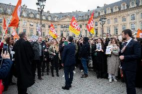 Gerald Darmanin talks to court clerks protesting at Place Vendome - Paris