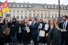 Gerald Darmanin talks to court clerks protesting at Place Vendome - Paris