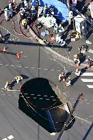 Sinkhole at intersection in Yashio, near Tokyo