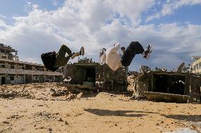 Young Palestinians Perform Between The Ruins - Gaza